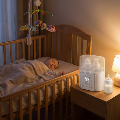 Bébé endormi avec chauffe biberon sur la table