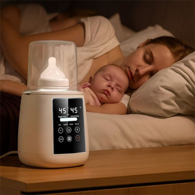 Chauffe biberon​ sur table pendant que maman et bébé dorment